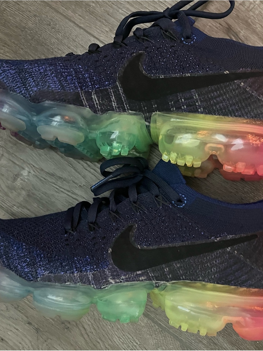 Nike Women’s Navy Flyknit Sneakers with Rainbow Bubble Sole